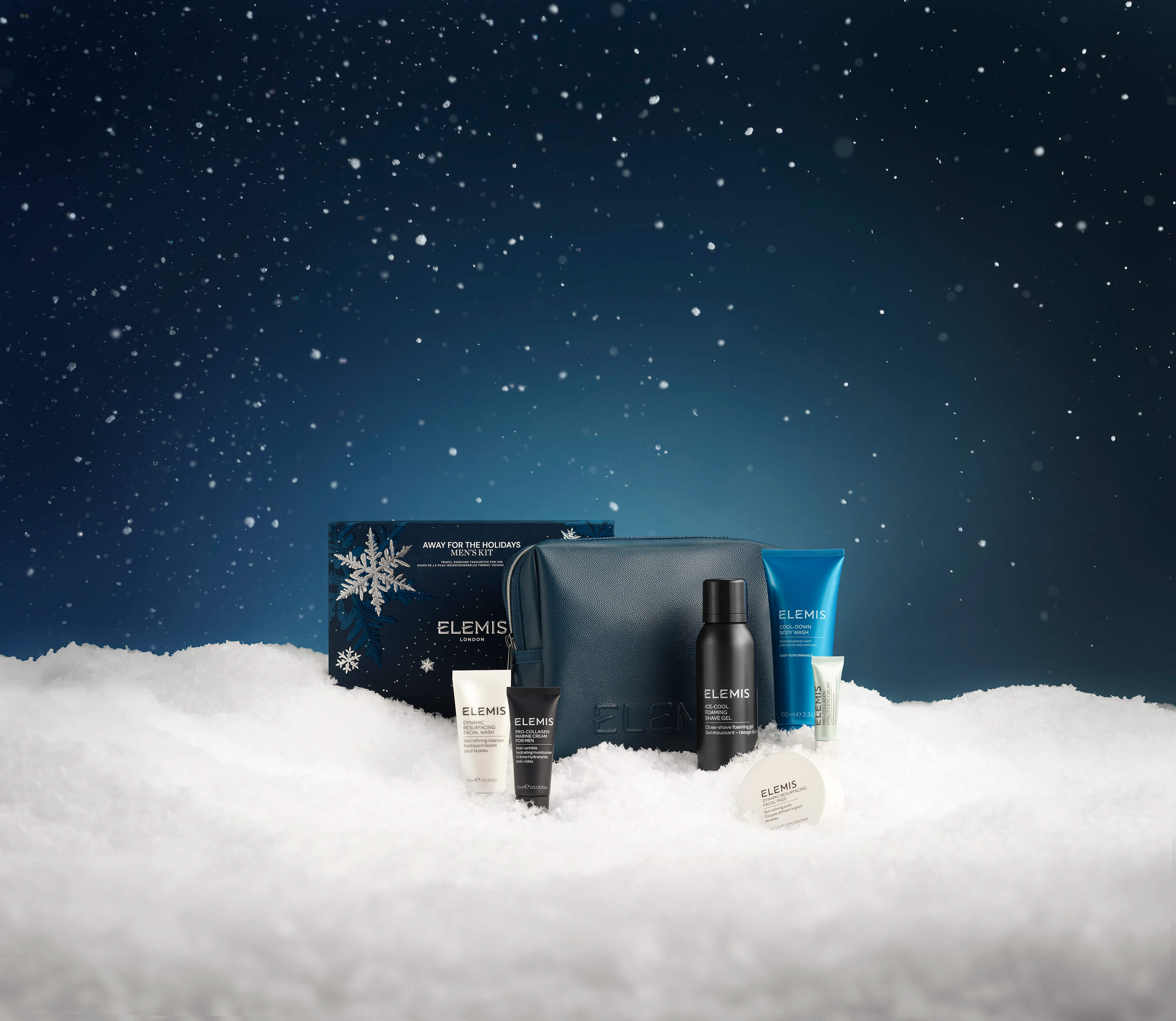 Elemis skincare products on a snowy landscape with a dark blue sky.