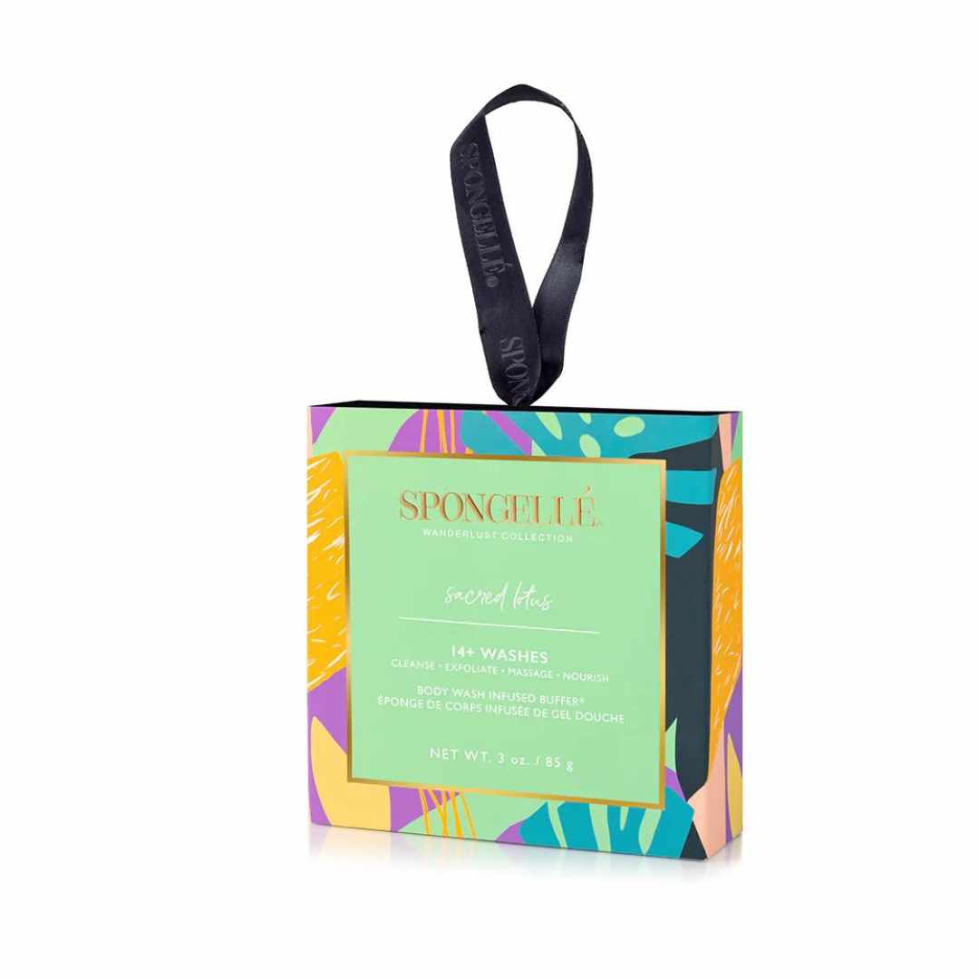 A boxed Spongellé body wash product with a vibrant, multicolored pattern and the brand name visible on the label.