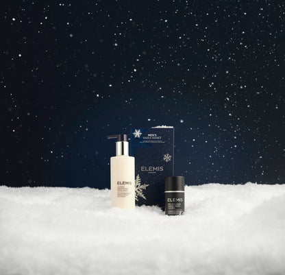 Elemis skincare products on a snowy landscape with a dark sky.