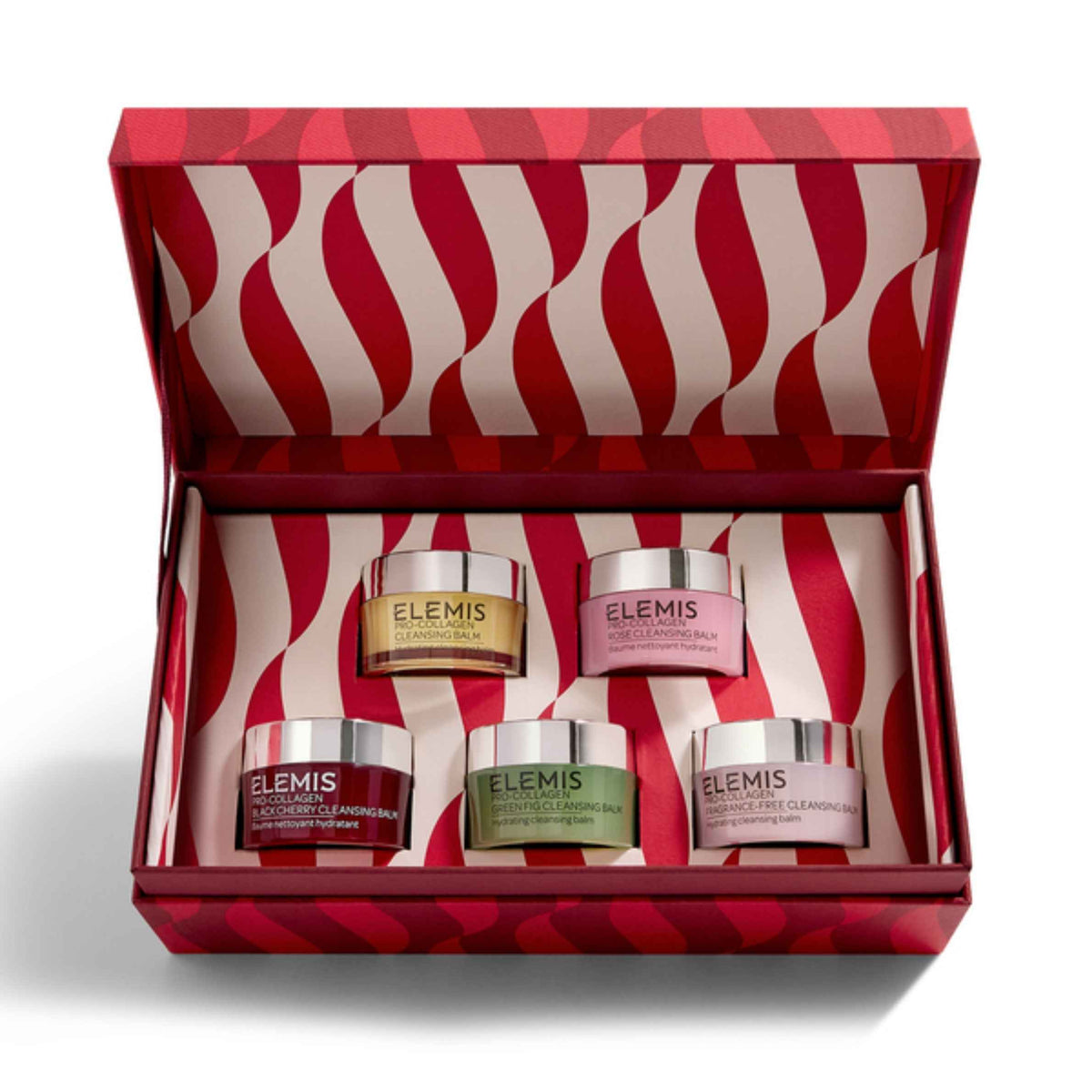 An open red and white patterned Elemis gift box containing five small cosmetic jars with silver lids, arranged on a white background.
