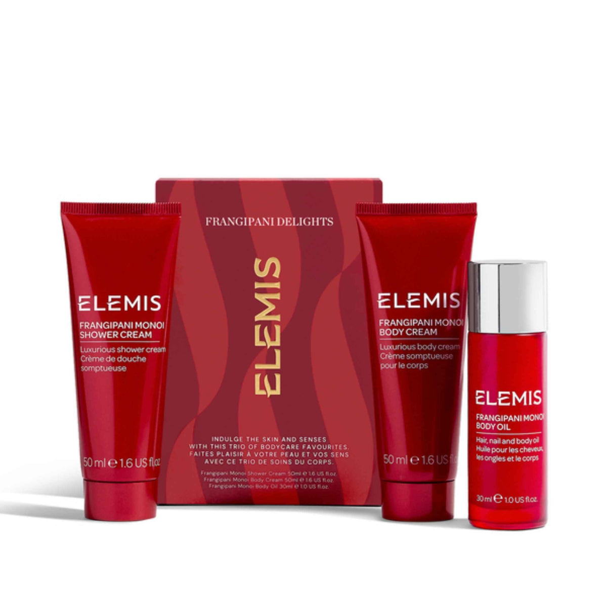 A Frangipani Delights Elemis body care set featuring a red shower cream tube, a red body cream tube, a red body oil bottle with a silver cap, and a red gift box, all on a white background.