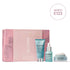 Elemis skincare set with pink packaging on a white background.