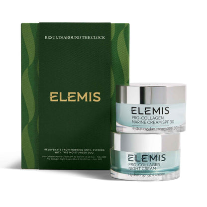 Elemis skincare set featuring a dark green textured box and two clear jars with silver lids: Pro-Collagen Marine Cream SPF 30 and Pro-Collagen Night Cream, on a white background.