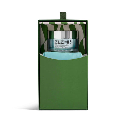 Elemis Pro-Collagen Night-Cream in a dark green gift box with a matching green and white patterned inner lid and a light blue tissue insert.
